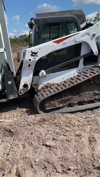 bobcat skid steer moves on its own|skid steer instructional videos.